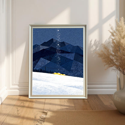 Framed art print in a White Frame (or light silver), featuring the winter mountain scene, leaning on a light hardwood floor against a white paneled wall, next to a large vase of dried pampas grass.