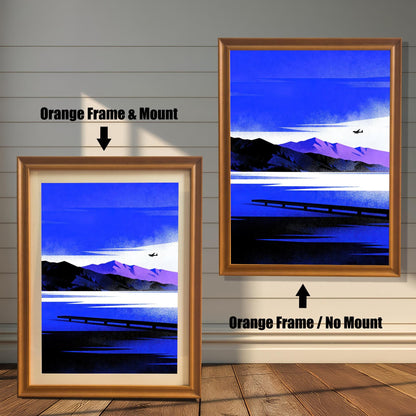 Blue Lake/Mountain	Comparison image showing the Blue Lake/Mountain art print in an Orange Frame & Mount (left) and an Orange Frame / No Mount (right), against a rustic wood-paneled wall.