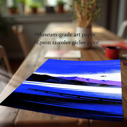Blue Lake/Mountain	Close-up of the print on a wooden table, showing a vibrant blue and purple stylized lake/mountain landscape with a small airplane. Text reads: "Museum-grade art paper," "Epson 12-color giclee print."