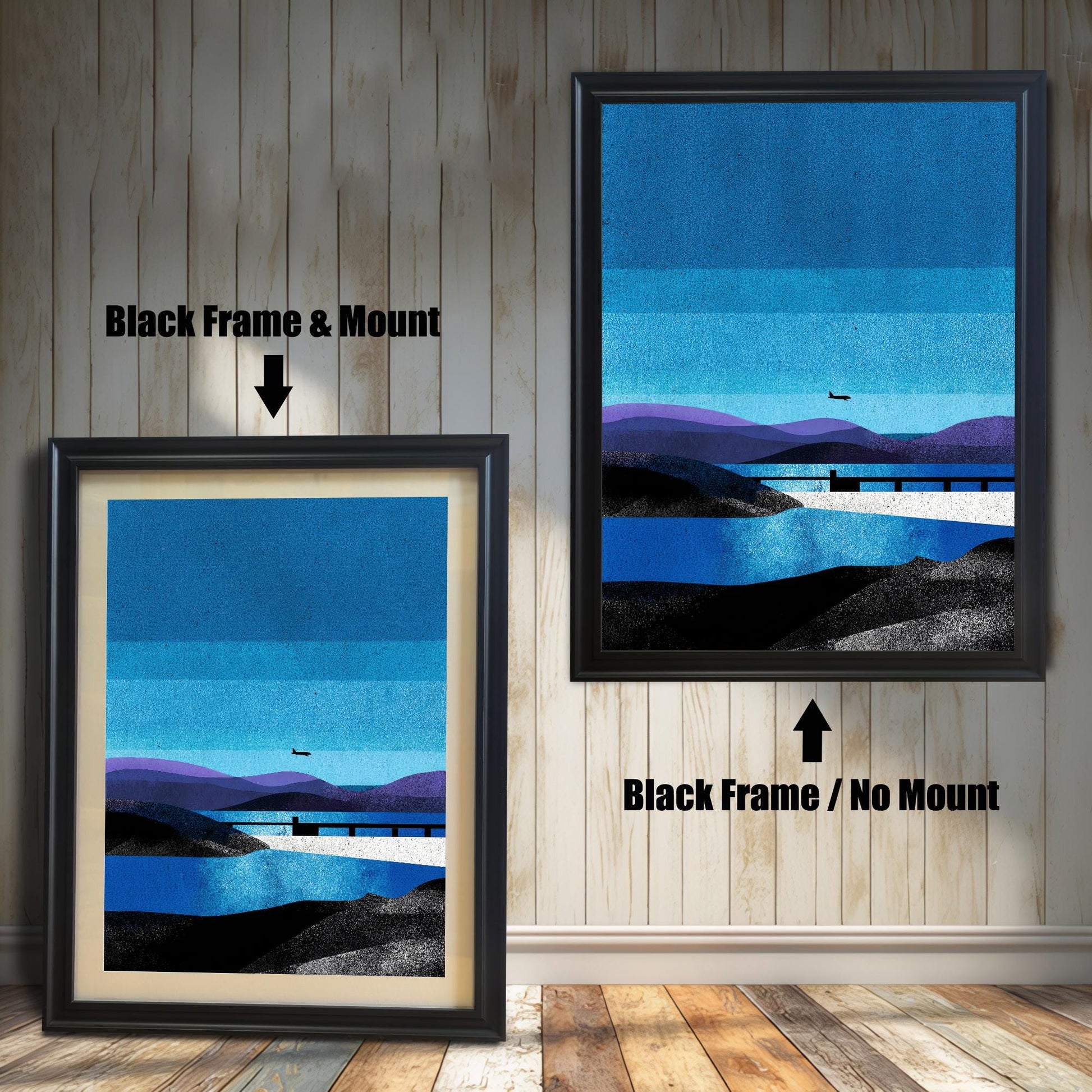 Two black wood-framed prints displayed on a wood-paneled wall; the left shows the "Black Frame & Mount" option with a border, and the right shows the "Black Frame / No Mount" full-bleed option.