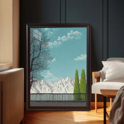 A large, dark Coffee brown wood framed art print featuring a mountain and lake scene, leaning on a herringbone wood floor next to a grey armchair in a moody, dark-walled room.