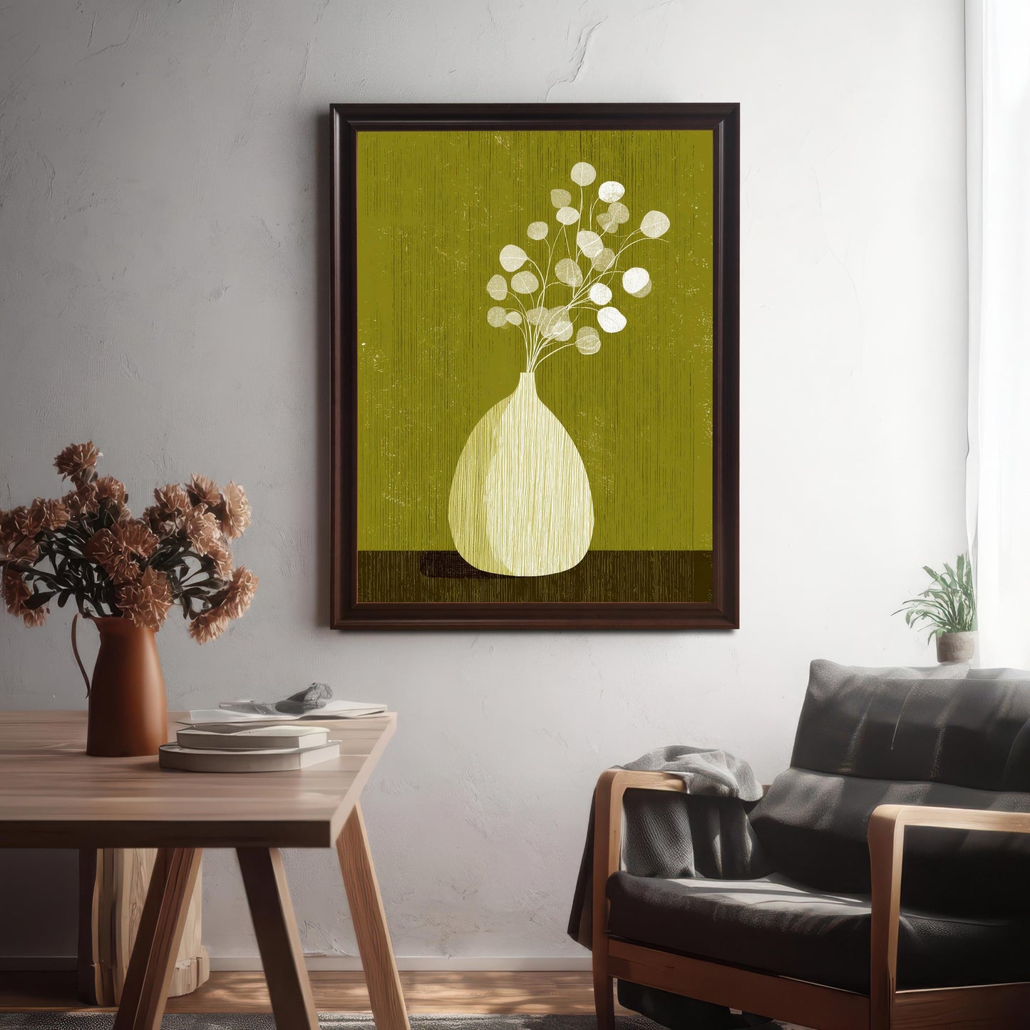Mid-century modern botanical print in a coffee-colored wood frame hanging above a black leather armchair, shown in a bright, modern living room setting.