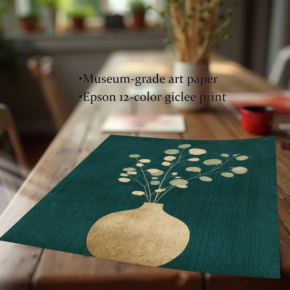 A close-up view of a high-quality giclee art print on museum-grade paper, showing the rich teal texture and gold leaf details of the floral design on a wooden table.