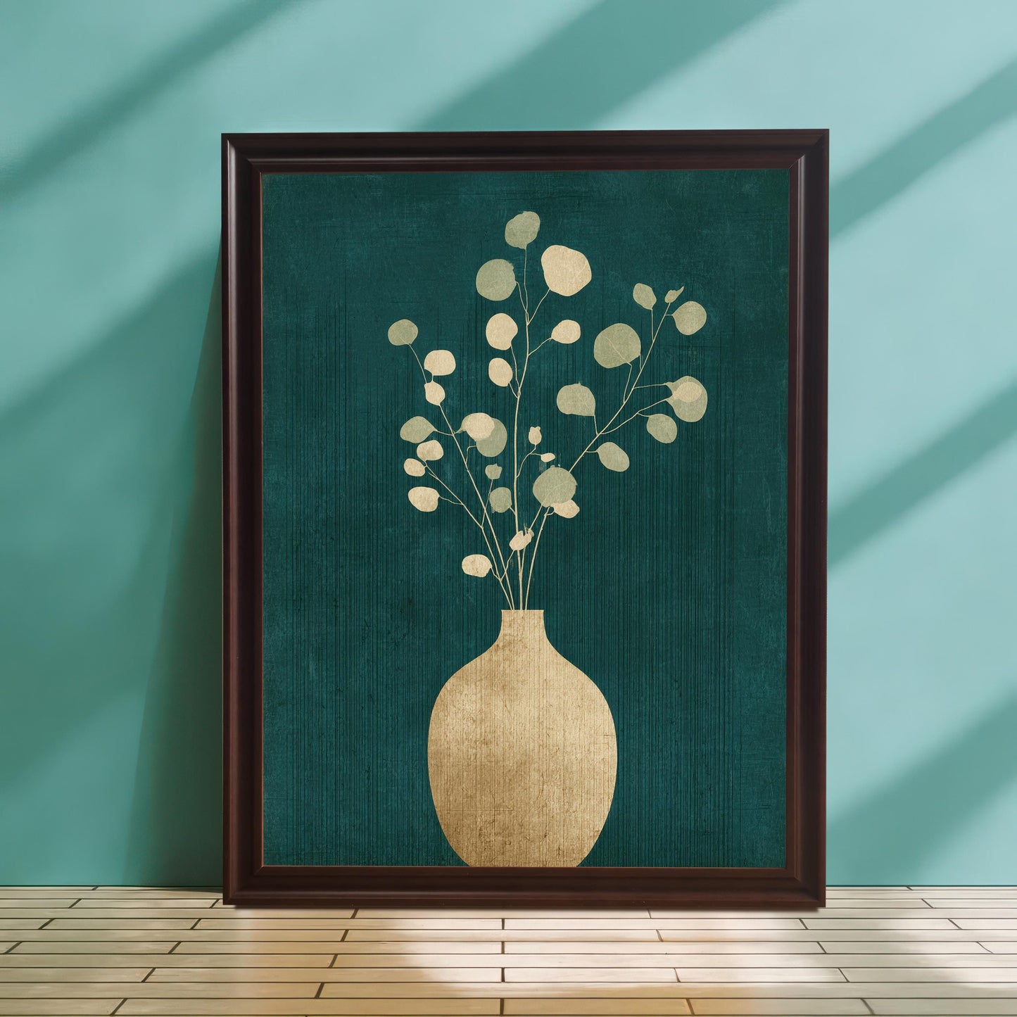 A dark wood-framed teal and gold floral print leaning against a smooth light-blue wall on a light-colored tiled floor, showcasing the rich colors of the giclee print in a minimalist setting.