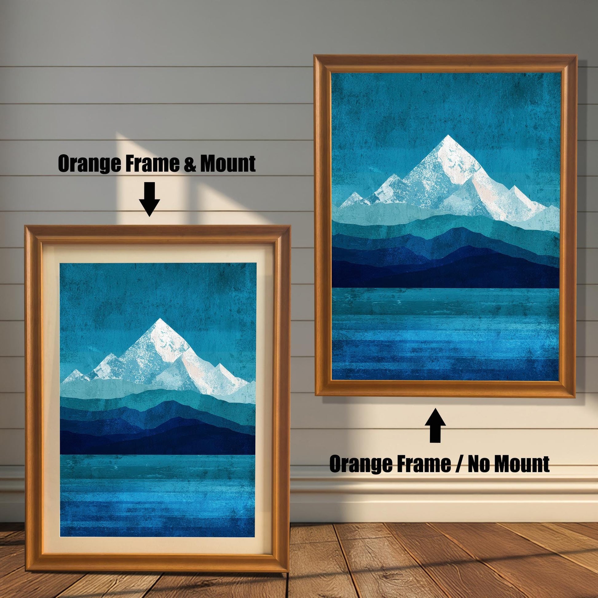 Comparison layout showing two orange wood frames: one on the left with an off-white mat (mount) and one on the right without a mat, showcasing the full-bleed print.