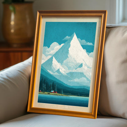 An orange-wood framed art print with a mat mount leaning against a grey couch, showing the artwork in a cozy, natural lighting home setting.
