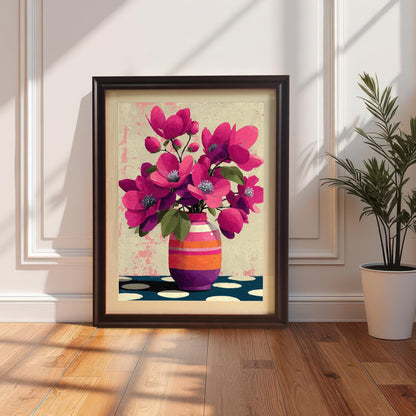 Dark coffee-colored wood frame with a white mount featuring a pink flower print, leaning against a classic paneled wall next to a potted plant.