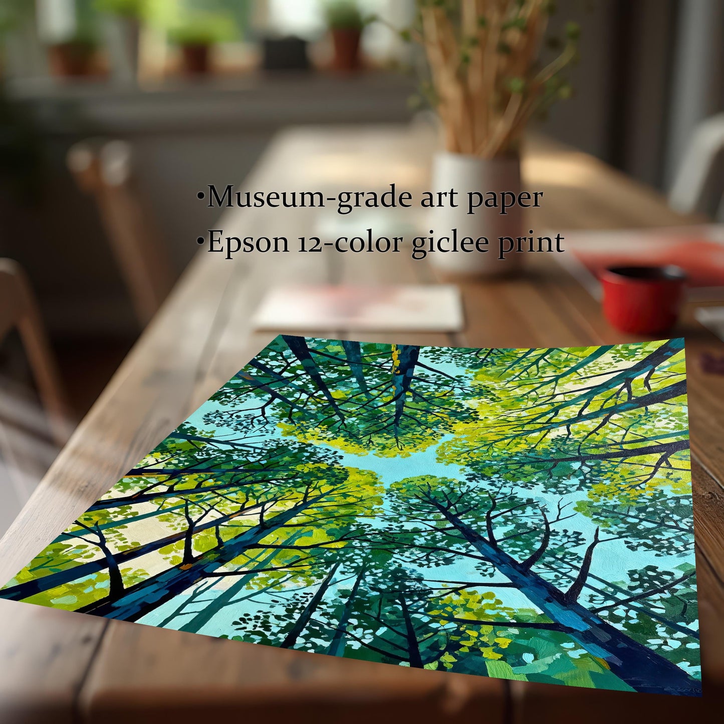 Close-up of a high-quality Giclee art print on museum-grade paper featuring a vibrant green and blue forest canopy illustration.