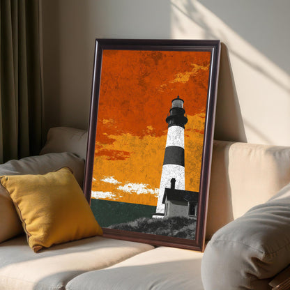 A framed lighthouse art print in a dark coffee wood frame leaning on a beige sofa next to a yellow pillow, showing natural window light and shadows.