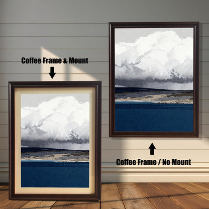 A side-by-side comparison of the abstract landscape in a deep Coffee-colored wood frame; the left version includes a cream mat mount and the right version is shown without a mount against a neutral wall with horizontal paneling.