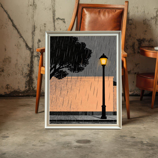 A vertical wood-framed art print of a rainy street scene leaning against a rustic concrete wall next to a leather chair and wooden side table in a dimly lit, industrial-style room.
