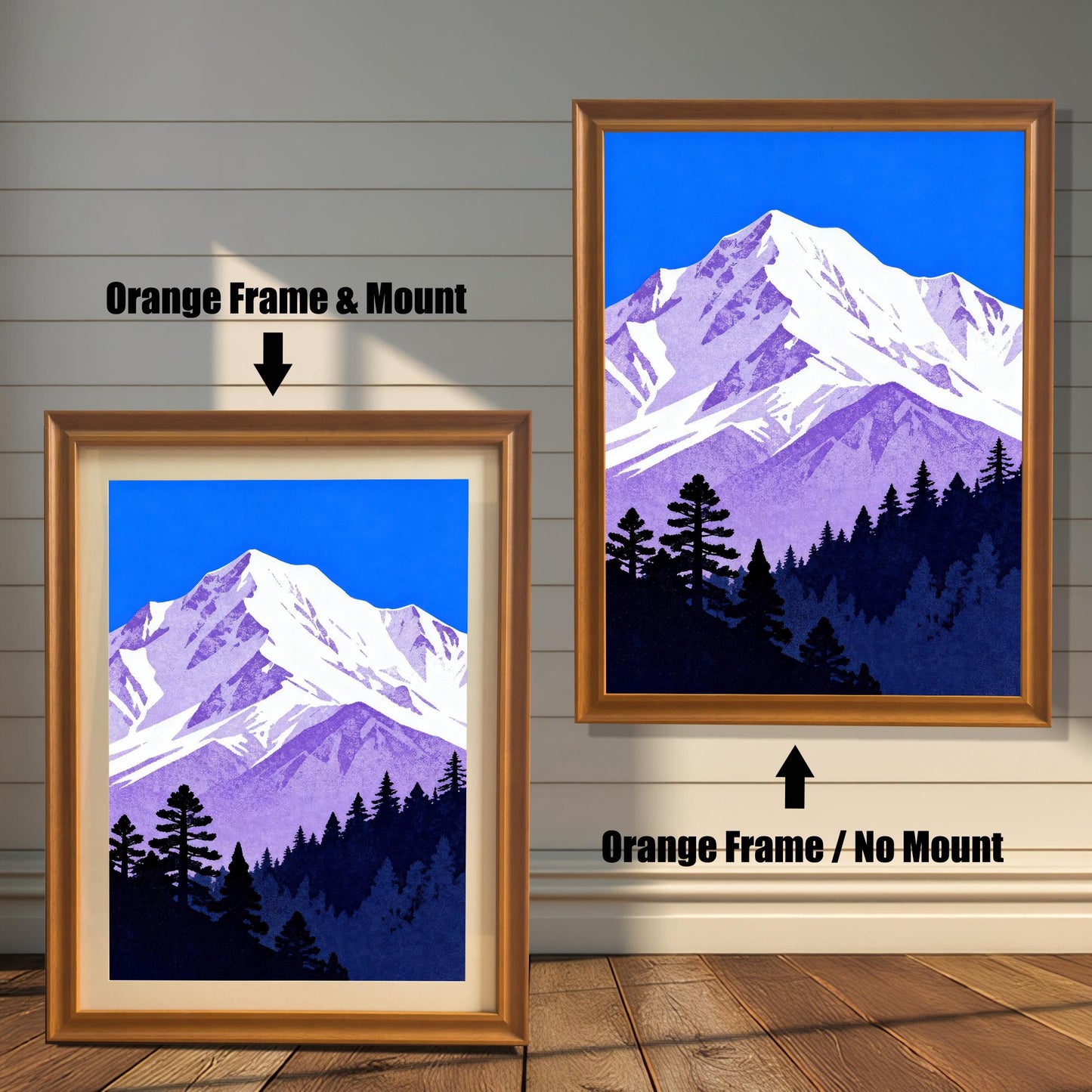 Comparison image of the mountain art print: A smaller print in an 'Orange' wood frame with a cream mount, next to a larger print in an 'Orange' wood frame without a mount.