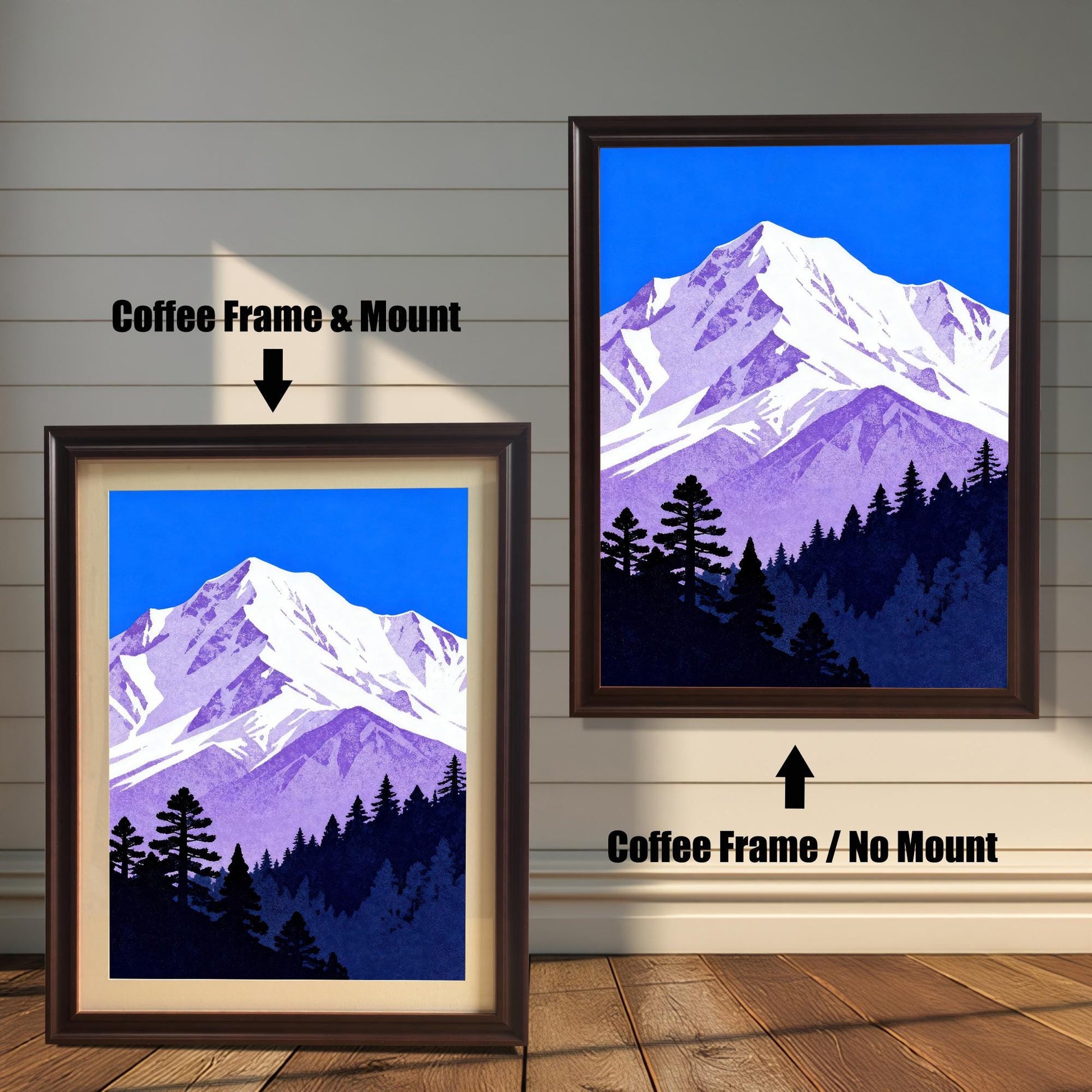 Comparison image of the purple and blue mountain art print: A smaller print in a dark brown 'Coffee' wood frame with a cream mount, next to a larger print in a 'Coffee' wood frame without a mount.