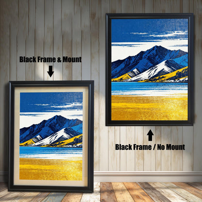 Two framed art prints on a wooden shiplap wall. Both prints feature the same blue and yellow mountain landscape. The left print shows the art in a Black Frame & Mount (matting). The right print shows the art in a Black Frame / No Mount.