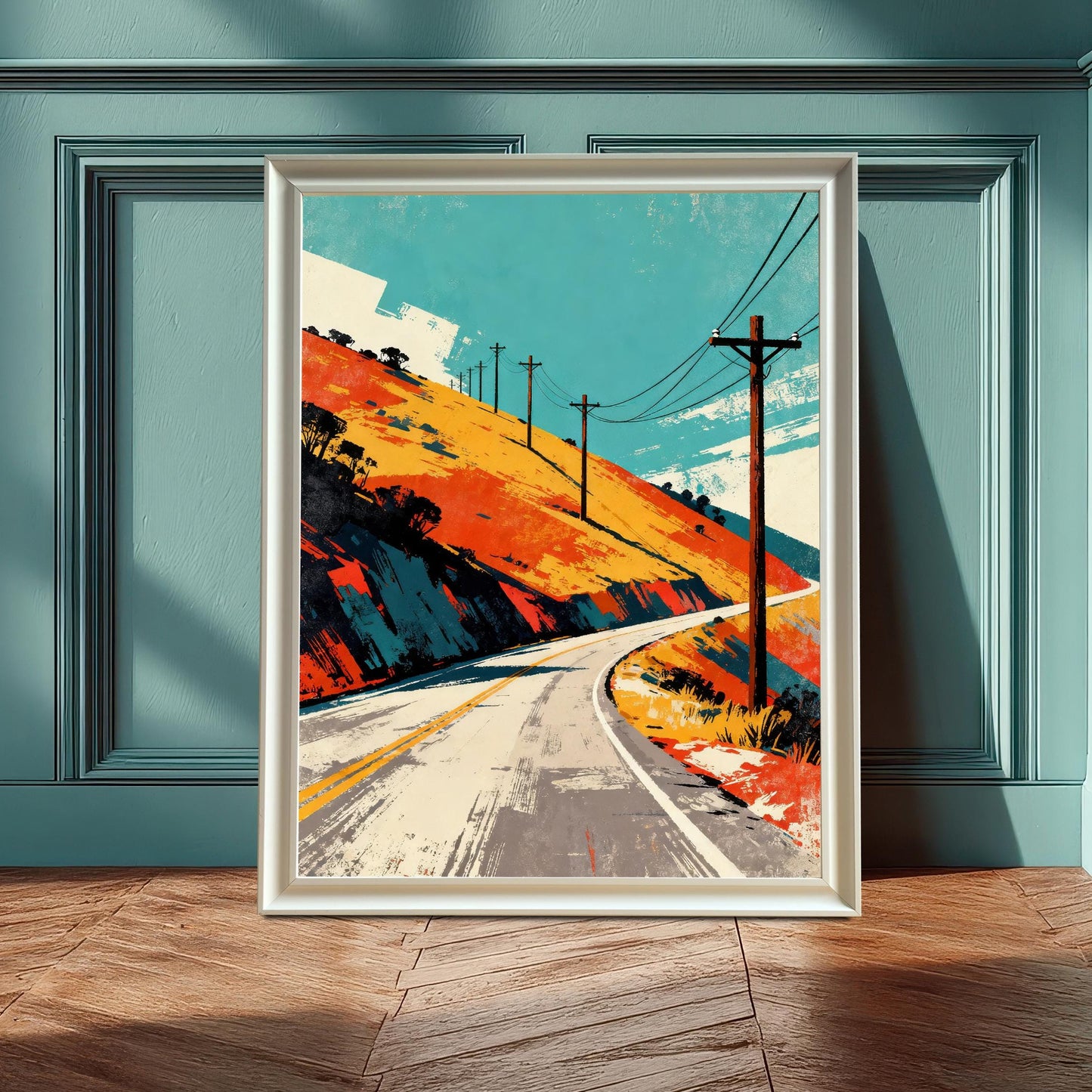 The art print, framed in White, is leaning against a paneled teal (or light blue-green) wall on a wooden floor. Dramatic sunlight casts a shadow of a window frame onto the wall and floor.
