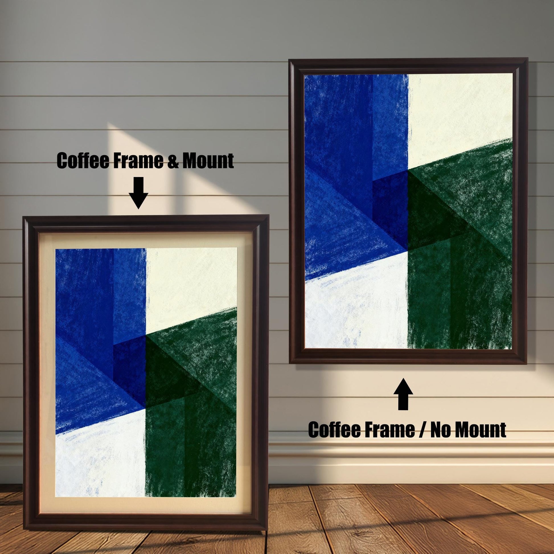 Abstract art print with geometric shapes in dark blue, deep green, and off-white. The image shows two framing options against a white shiplap wall and wood floor. The print on the left has a Coffee Frame & Mount (or matting), making the art appear smaller. The print on the right has a Coffee Frame / No Mount, where the art fills the frame completely.