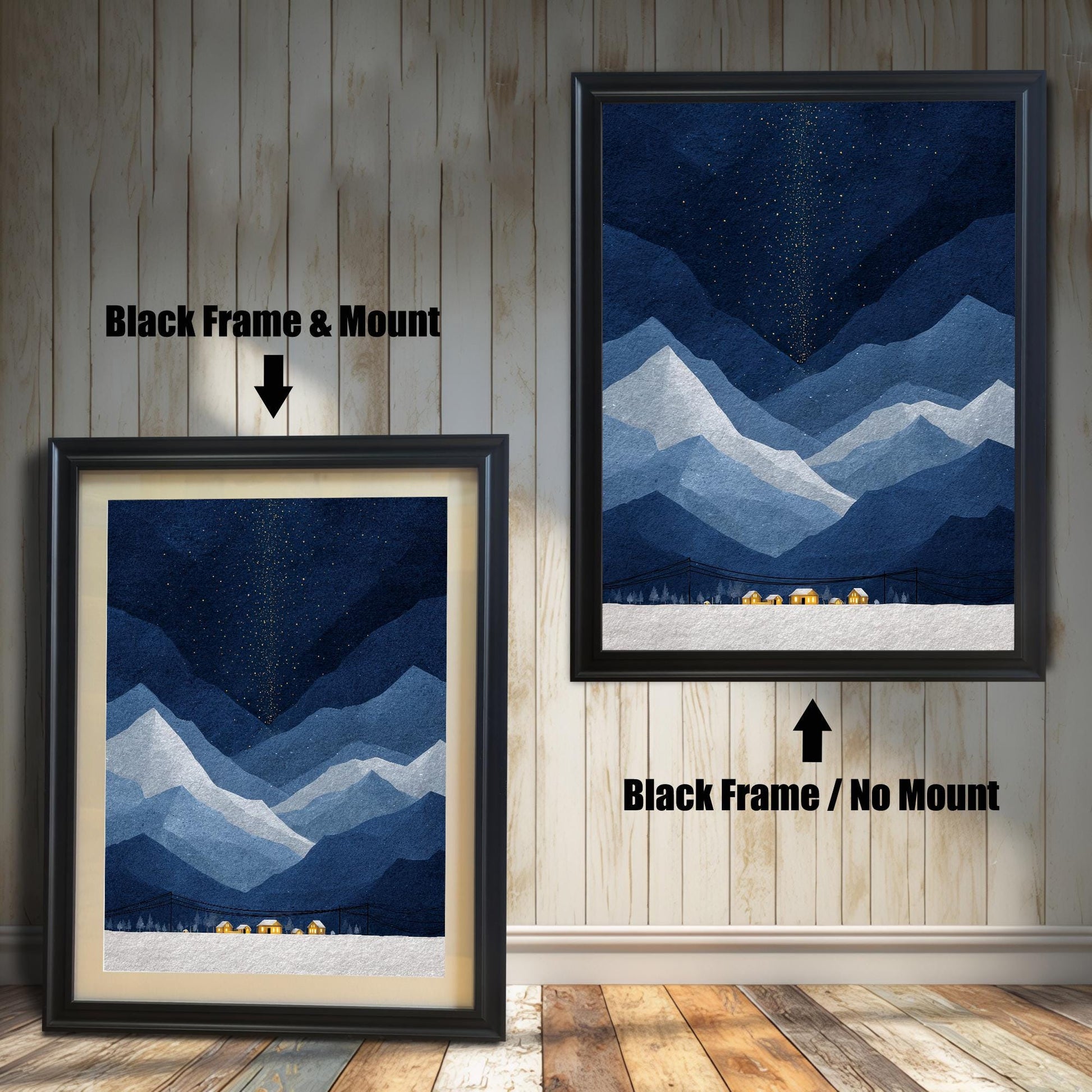 Two black-framed versions of a blue mountain art print displayed against a wood-paneled wall: one with a cream-colored mount (matting) and one without a mount.