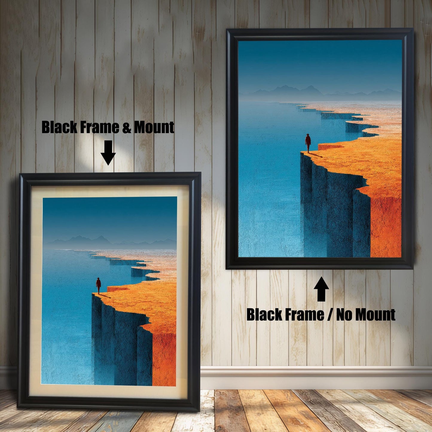 A product comparison on a light wood-paneled wall showing a black-framed art print in two styles: one with a cream-colored mount/mat on the left and one without a mount on the right.