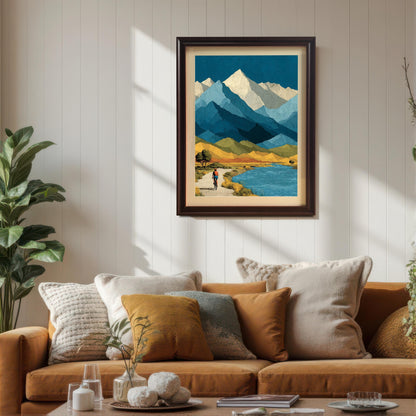 A dark brown "Coffee" wood-framed art print with a cream mat, hung on a white wood-slat wall above a cozy orange sectional sofa with various decorative pillows.