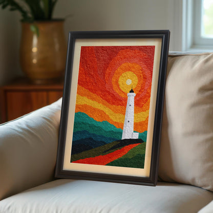 A framed art print of a stylized lighthouse at sunset, leaning against a neutral-colored couch in a modern, sunlit living room.