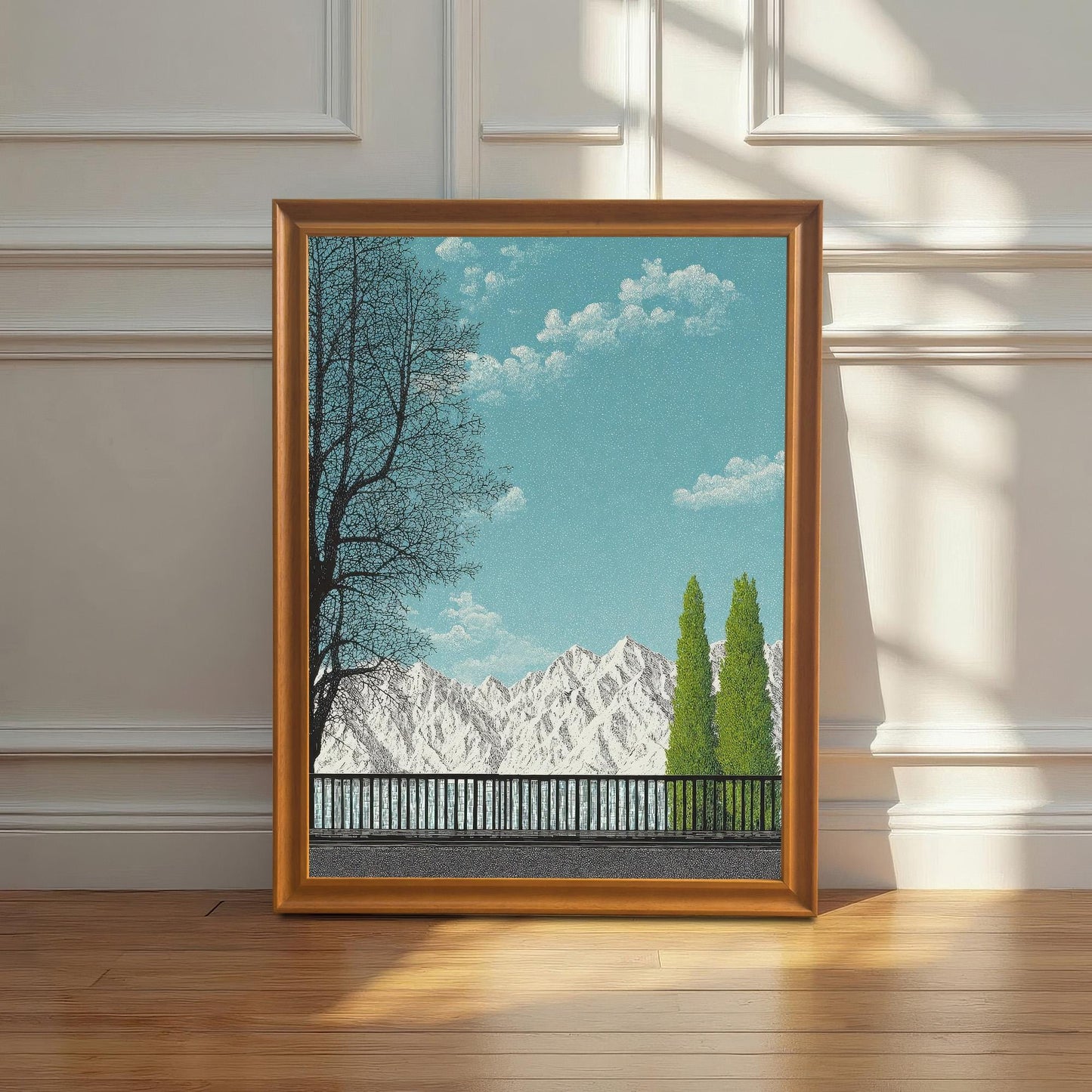 A vertical Orange wood framed landscape print resting on a light wood floor against a white wainscoted wall with elegant afternoon shadows.
