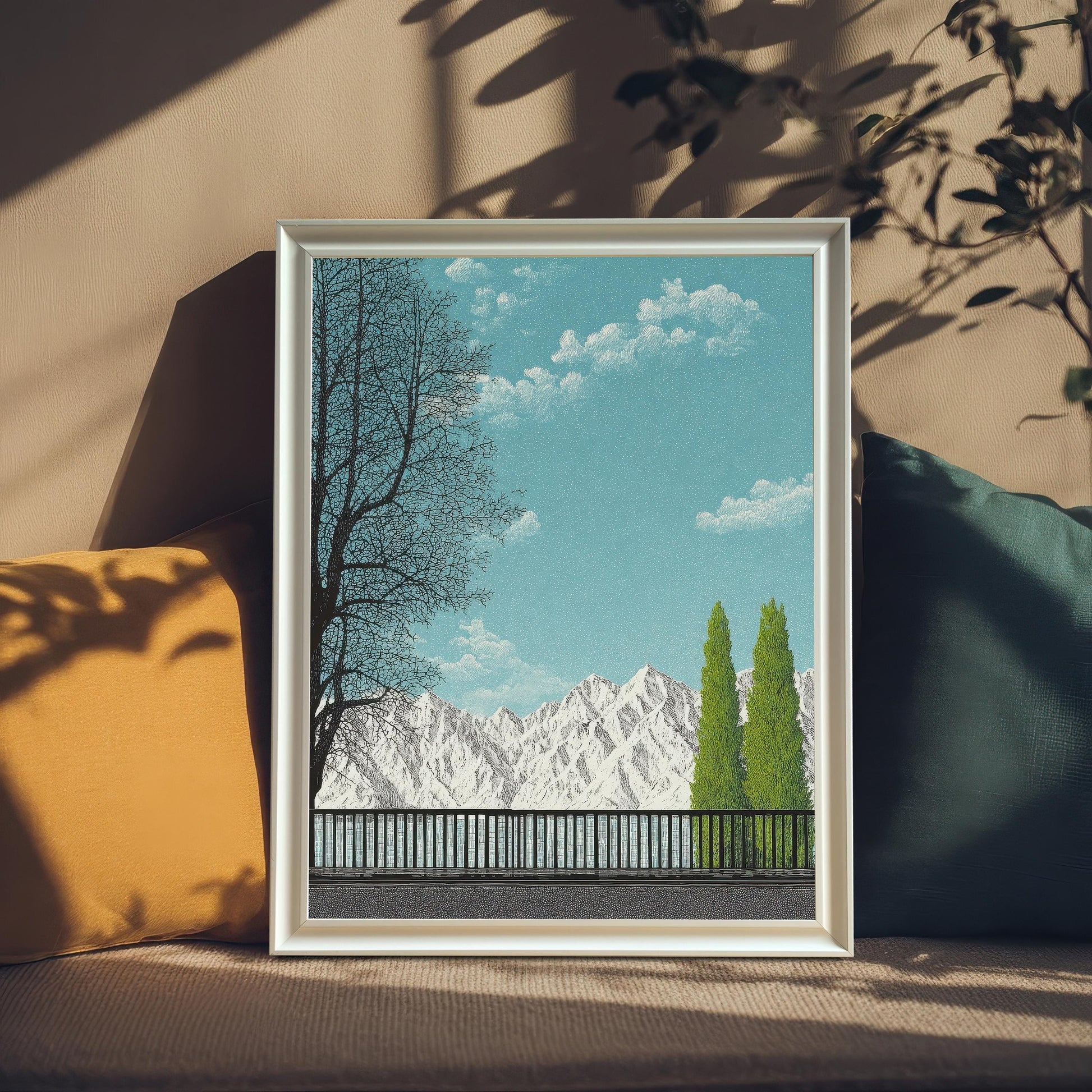 A vertical white wood framed art print featuring a serene mountain landscape with a turquoise sky, leafless trees, and two vibrant green cypress trees, leaning against a neutral wall with soft shadows.