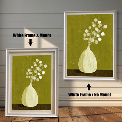 Comparison of the white wood frame style, showing the botanical print both with and without the white mat board (mount) against a neutral wall.