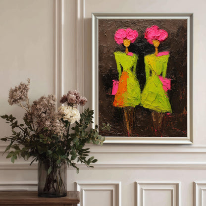 The colorful abstract artwork presented in a sleek white frame, hanging on a white wall with classic molding details above a dark wood table featuring a large glass vase of dried floral arrangements.