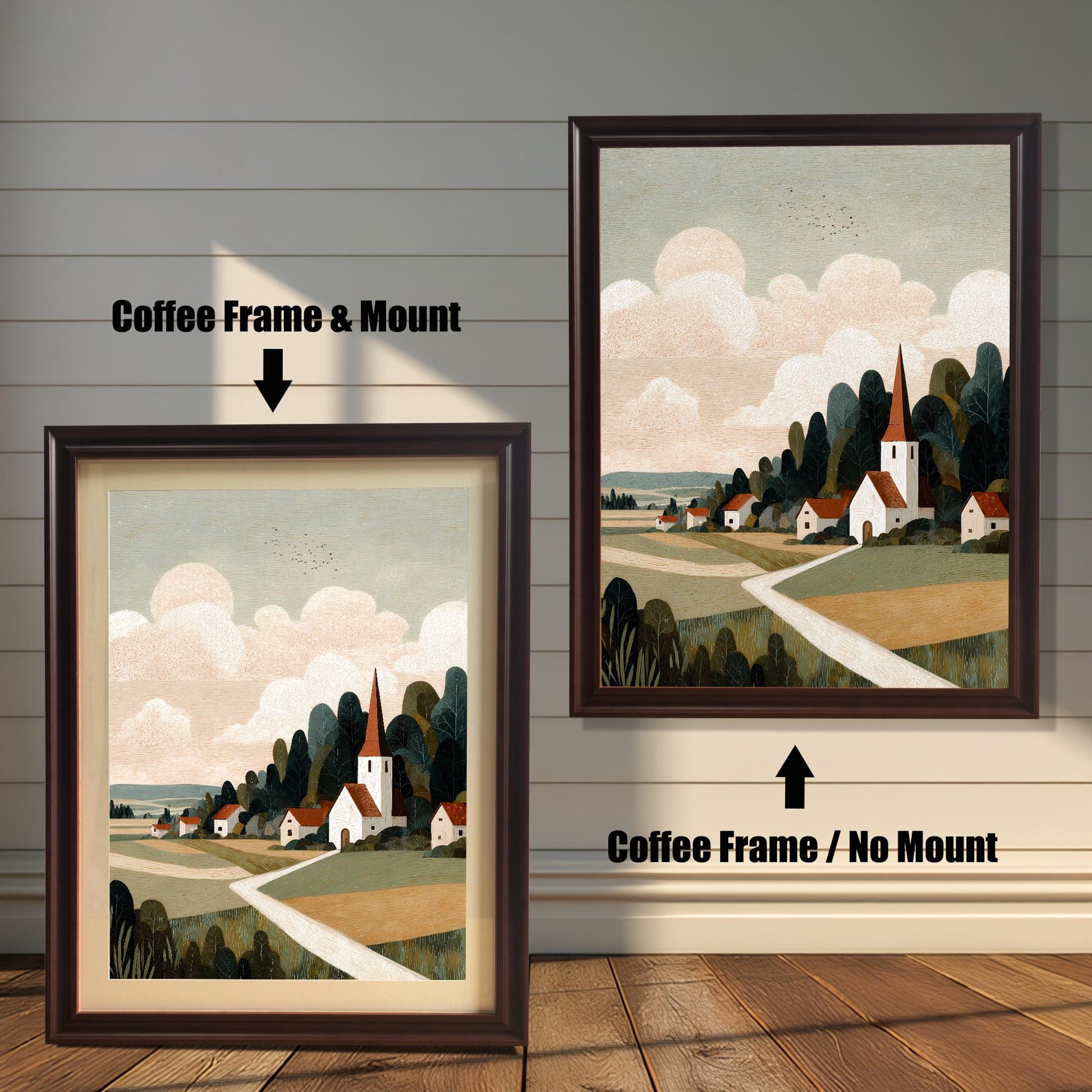 Product comparison showing the village landscape art in a ""Coffee Frame & Mount"" versus a ""Coffee Frame / No Mount"" in a sunlit room.