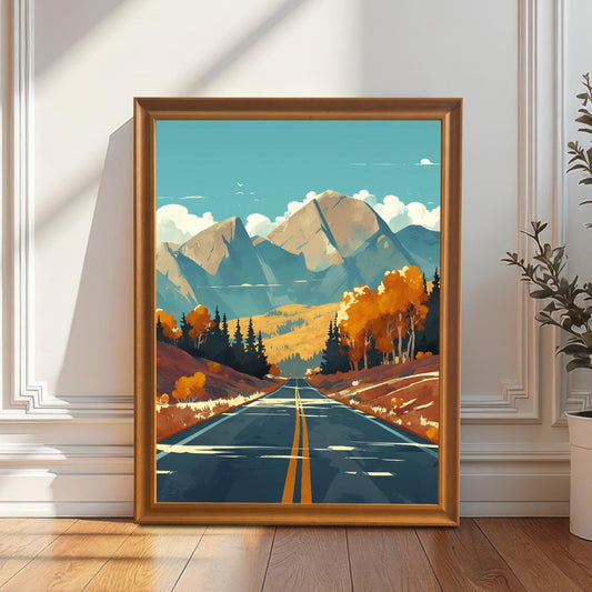 A mountain landscape art print in an orange wood frame leaning against a white paneled wall on a hardwood floor next to a potted plant.