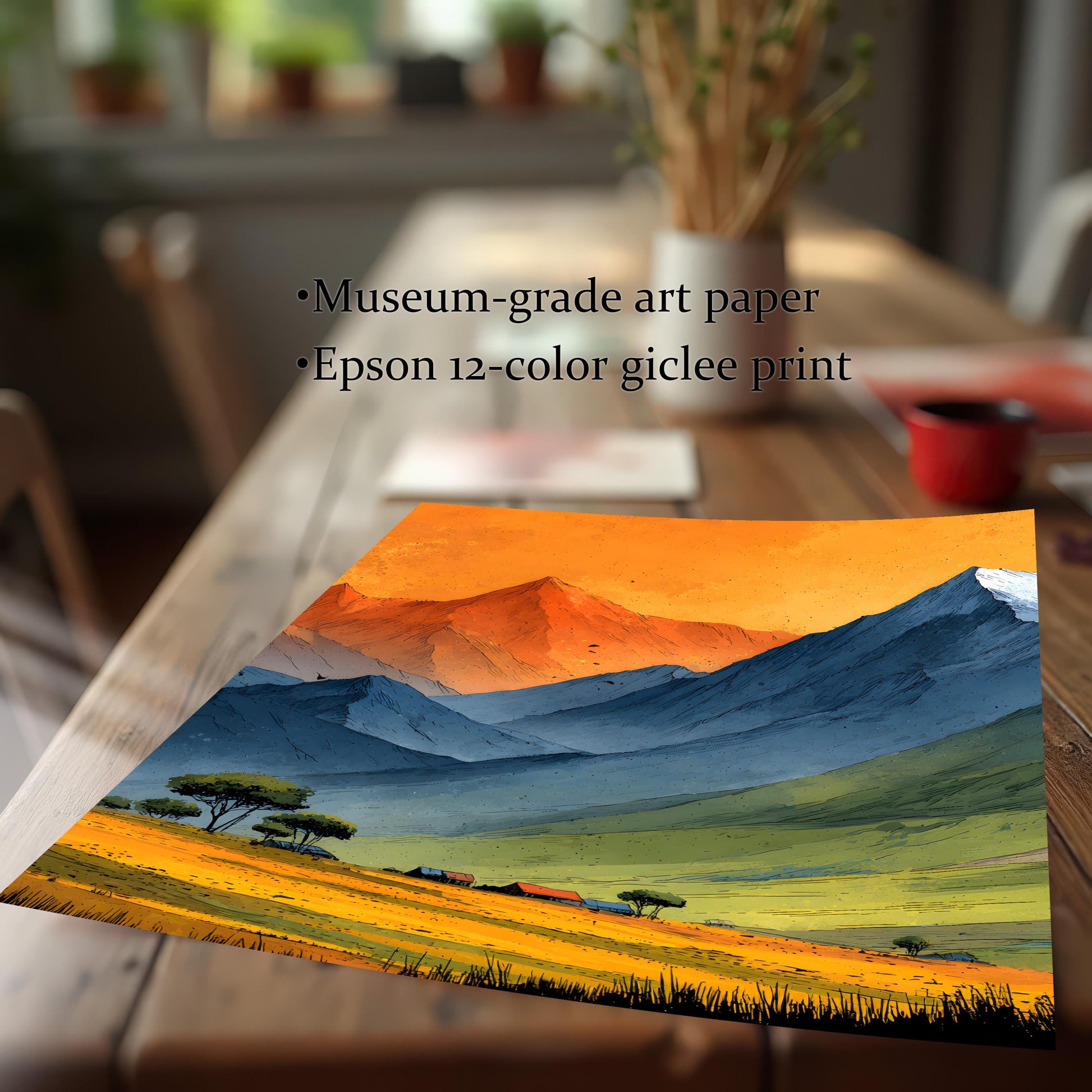 Close-up of a high-quality giclee art print on a wooden table. Text overlay reads "Museum-grade art paper" and "Epson 12-color giclee print," highlighting the vibrant orange and blue landscape details.