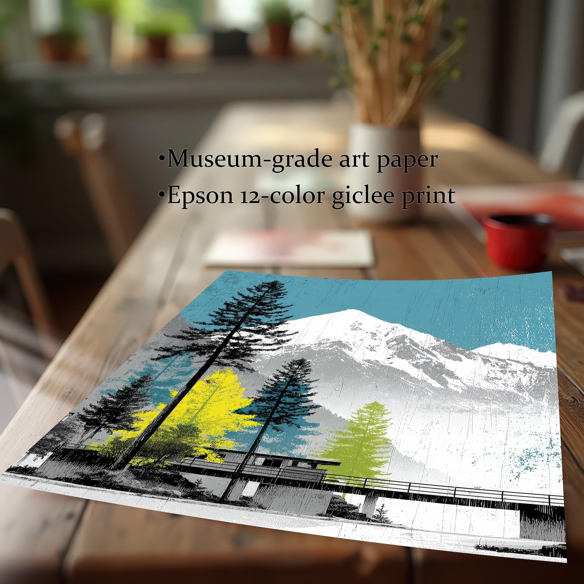 Close-up of a high-quality giclee art print on museum-grade paper, featuring a snowy mountain and colorful pine tree illustration.
