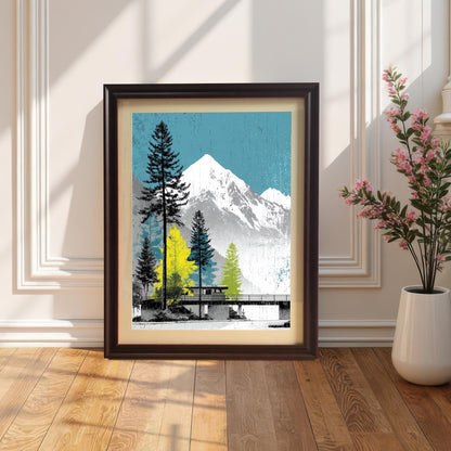 A coffee-colored dark wood frame with an ivory mount featuring a mountain landscape art print, leaning against a white paneled wall next to a vase of pink flowers.