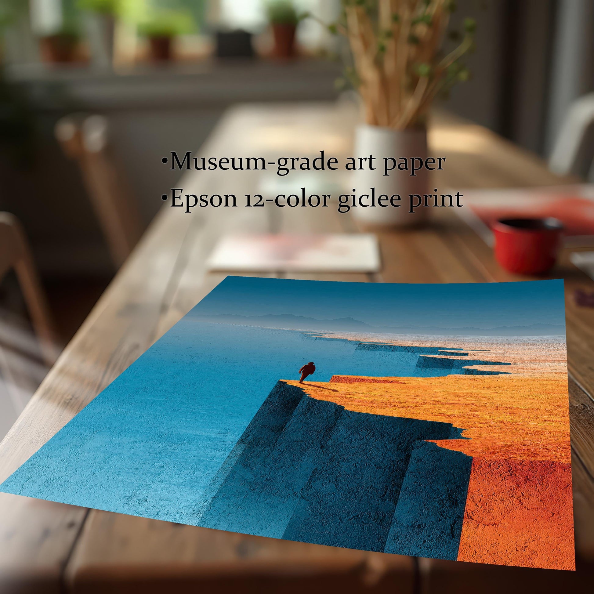 A close-up, angled view of a high-quality giclee art print resting on a wooden table. Text overlays highlight the "Museum-grade art paper" and "Epson 12-color giclee print" quality.