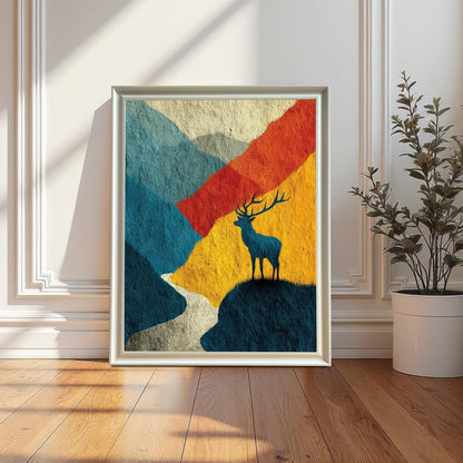 The abstract deer art print in a minimalist "White" wood frame, leaning against a white wainscoted wall on a polished wood floor next to a white potted plant.