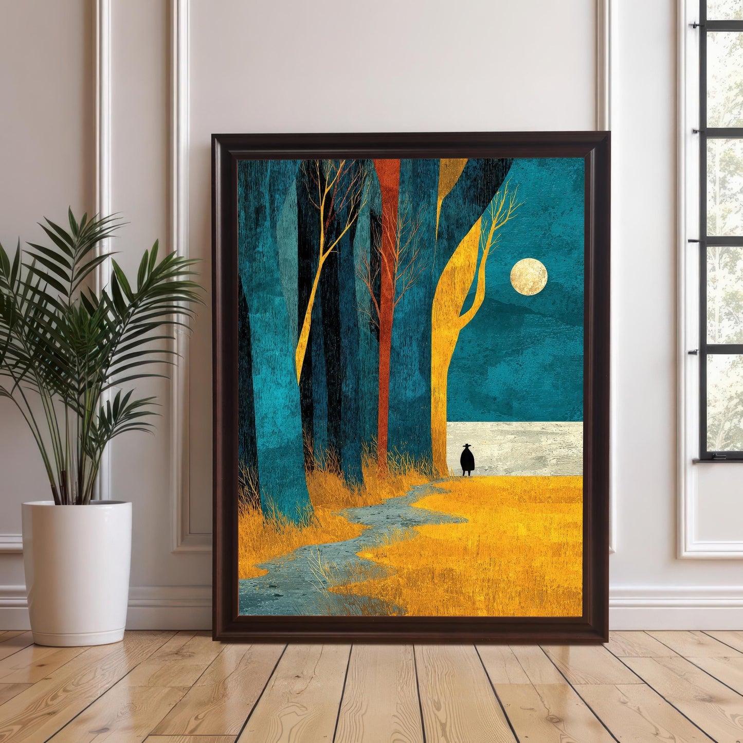 A vertical coffee-colored wood frame without a mount, showcasing the full-bleed forest illustration as it leans on a hardwood floor next to a white potted plant.