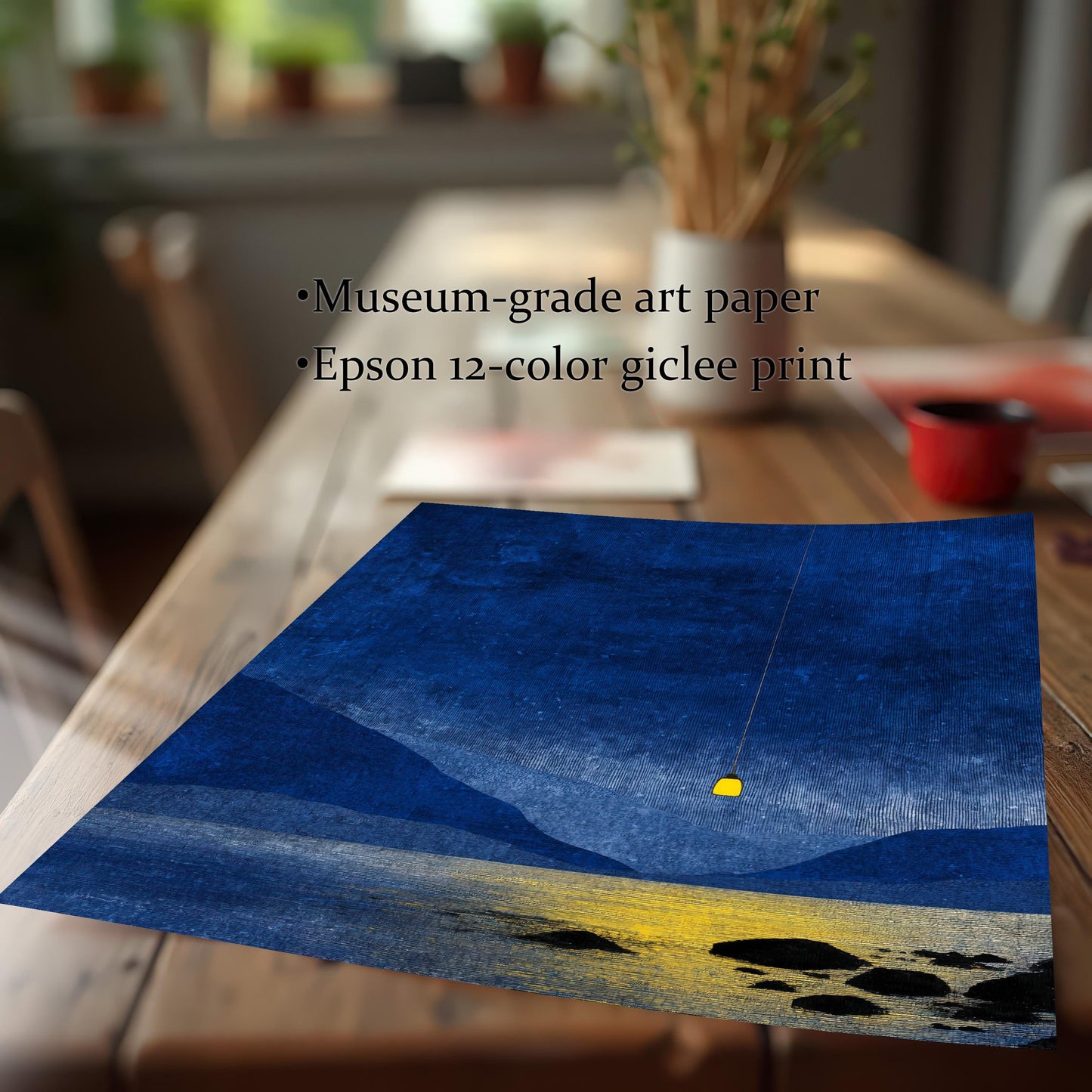 Close-up of a museum-grade art paper print featuring an Epson 12-color giclee blue landscape with a glowing yellow lantern detail.