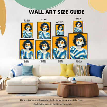 A wall art size guide showing various sizes of an art print featuring a woman with dark blue hair and orange glasses. The prints are arranged on a wall above a white sectional sofa.