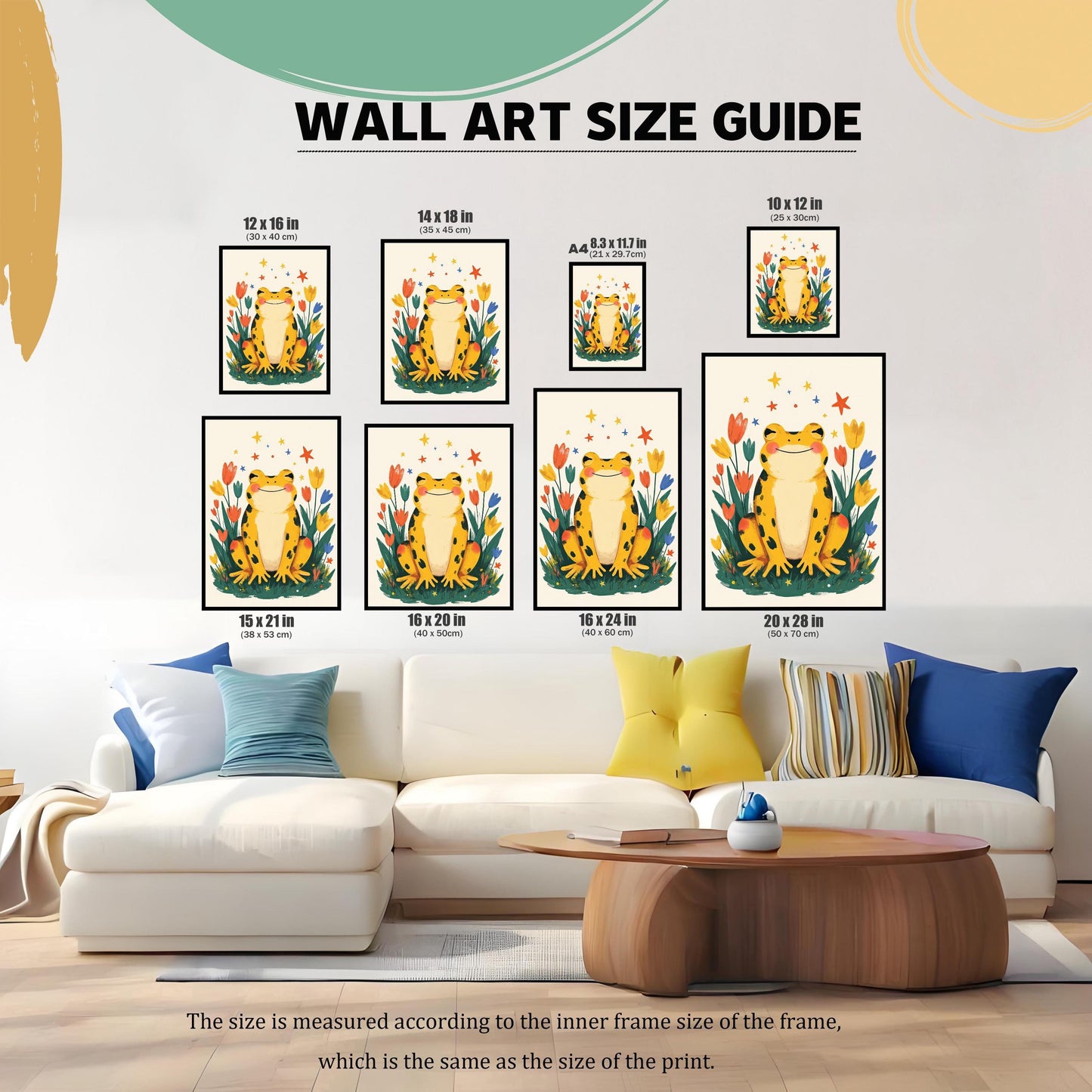 A "WALL ART SIZE GUIDE" showing different sizes of the happy yellow frog print. The prints are displayed in various black frames, arranged over a large white couch to illustrate a range of size options, including 12x16, 14x18, and A4. The text specifies that "the size is measured according to the inner frame size of the frame."