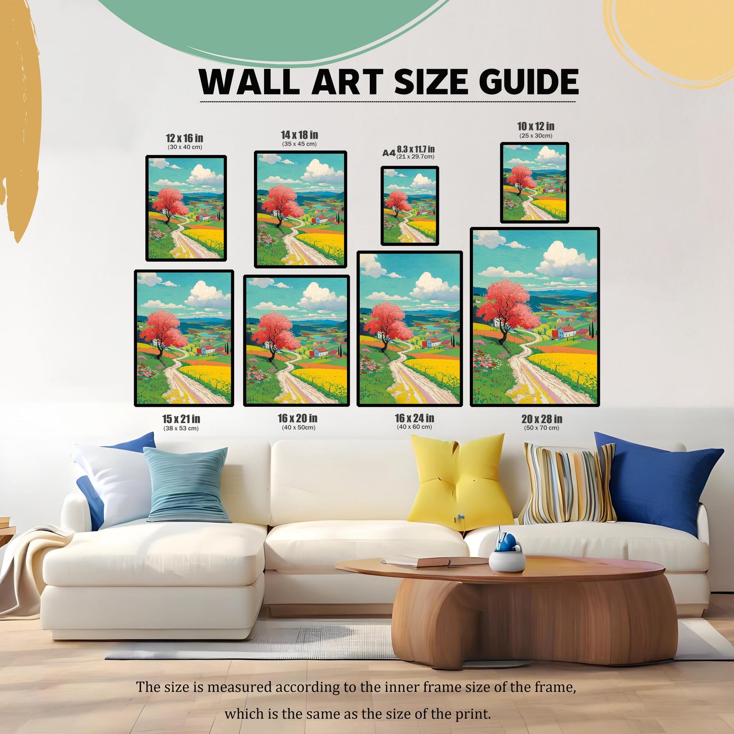 Wall art size guide showing seven different sizes of the framed landscape art print above a white couch, providing scale. The sizes are 12x16 in, 14x18 in, A4, 10x12 in, 15x21 in, 16x20 in, 16x24 in, and 20x28 in.