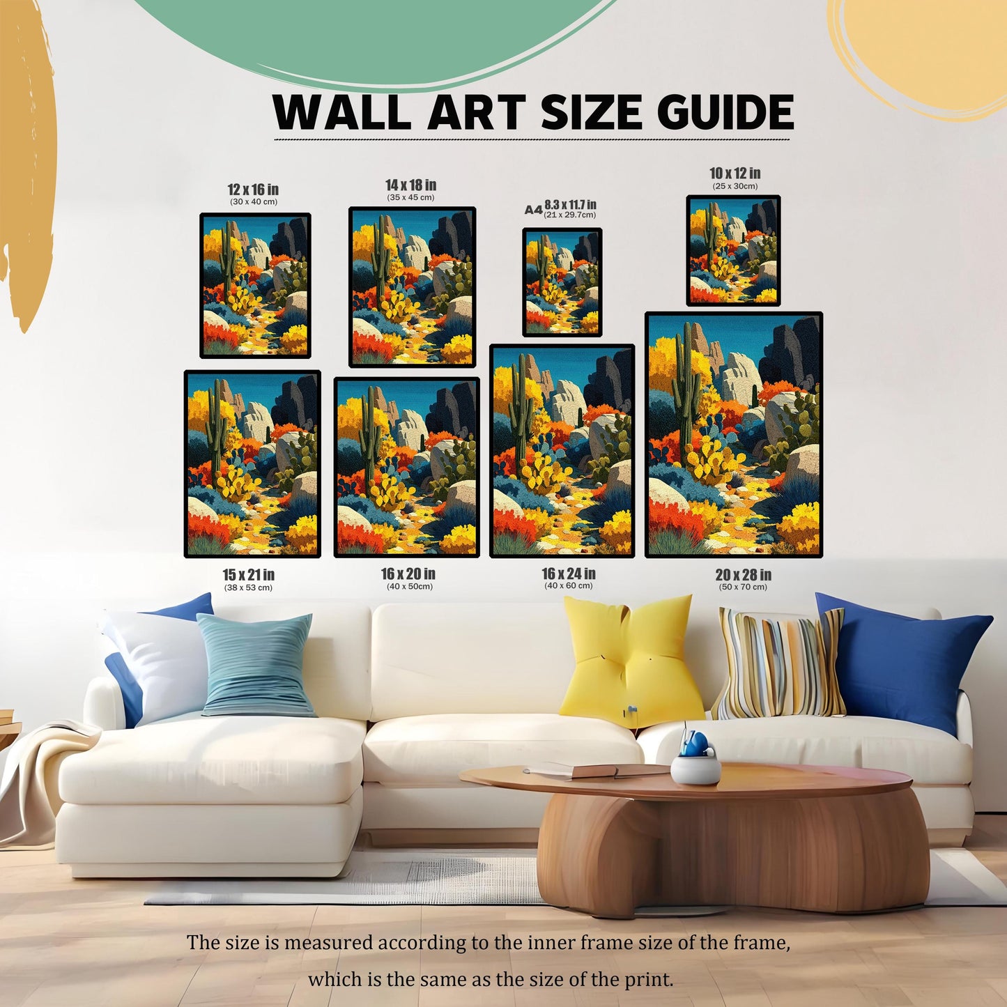 Wall art size guide showing seven different sizes of the framed desert landscape art print above a white couch, providing scale. Sizes include: 12x16 in, 14x18 in, A4, 10x12 in, 15x21 in, 16x20 in, 16x24 in, and 20x28 in.