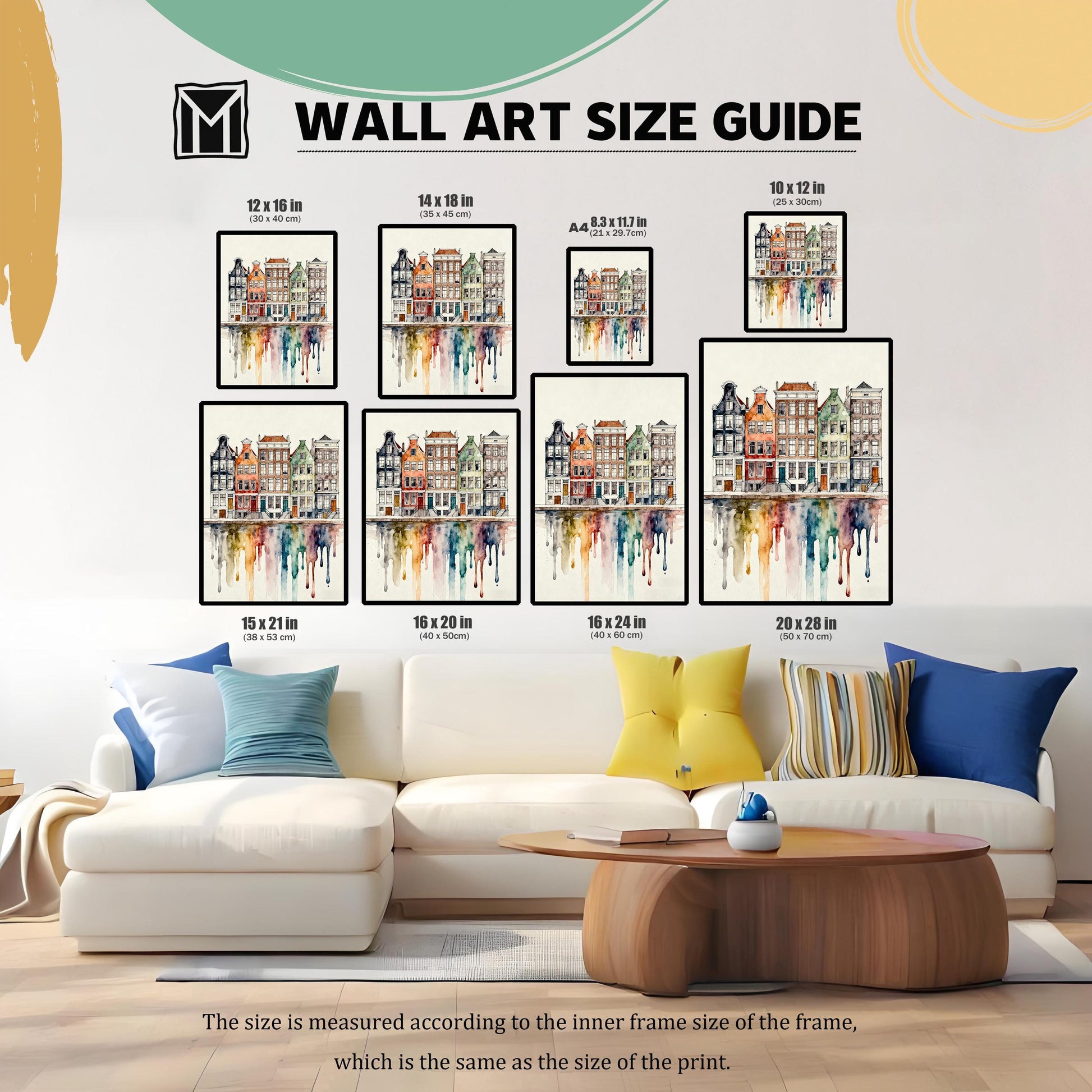 WALL ART SIZE GUIDE image showing eight different print sizes (e.g., 12x16 in, 20x28 in) arranged above a large white couch to illustrate relative scale in a living room setting.
