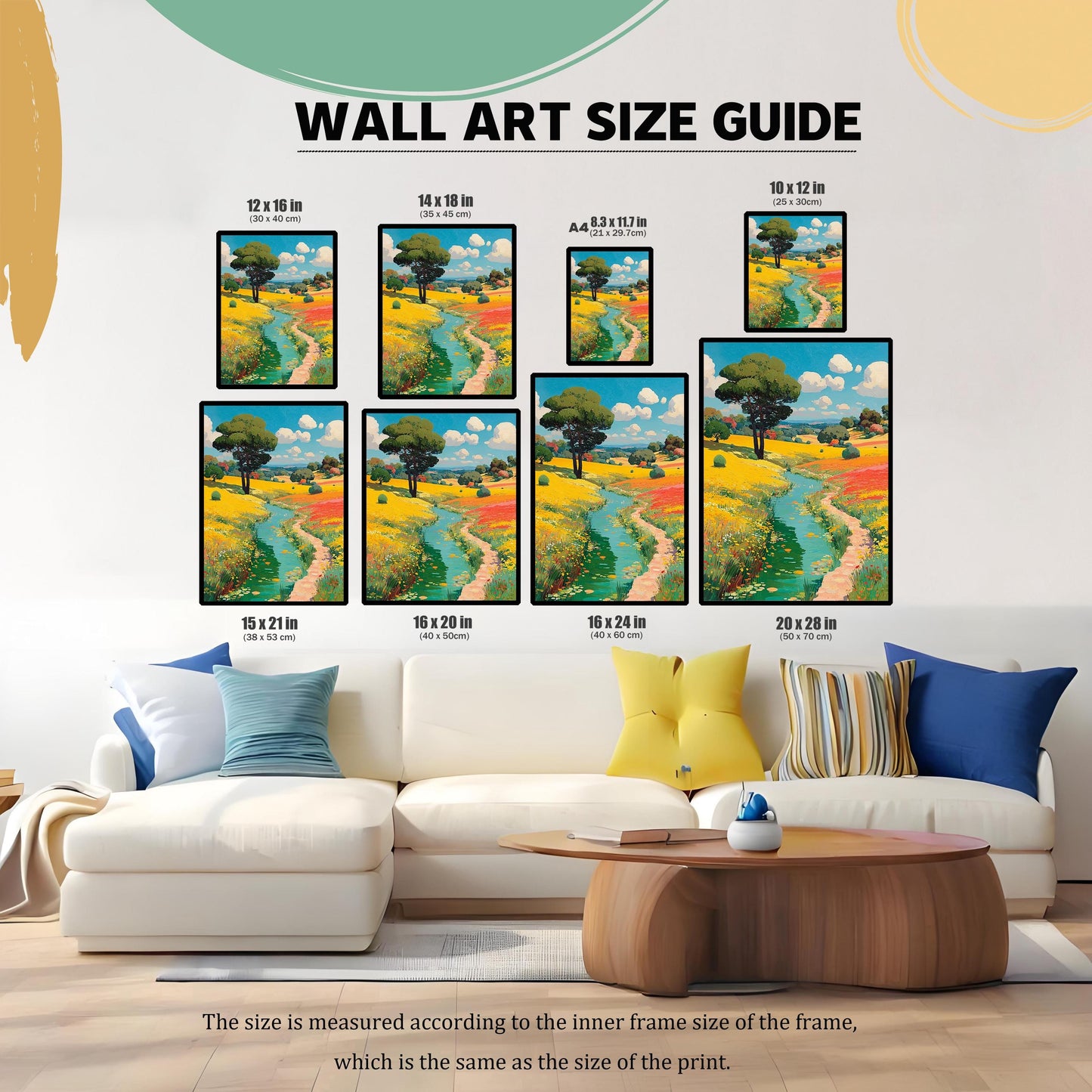 Wall art size guide showing seven different print dimensions in inches and centimeters, displayed over a couch in a living room.