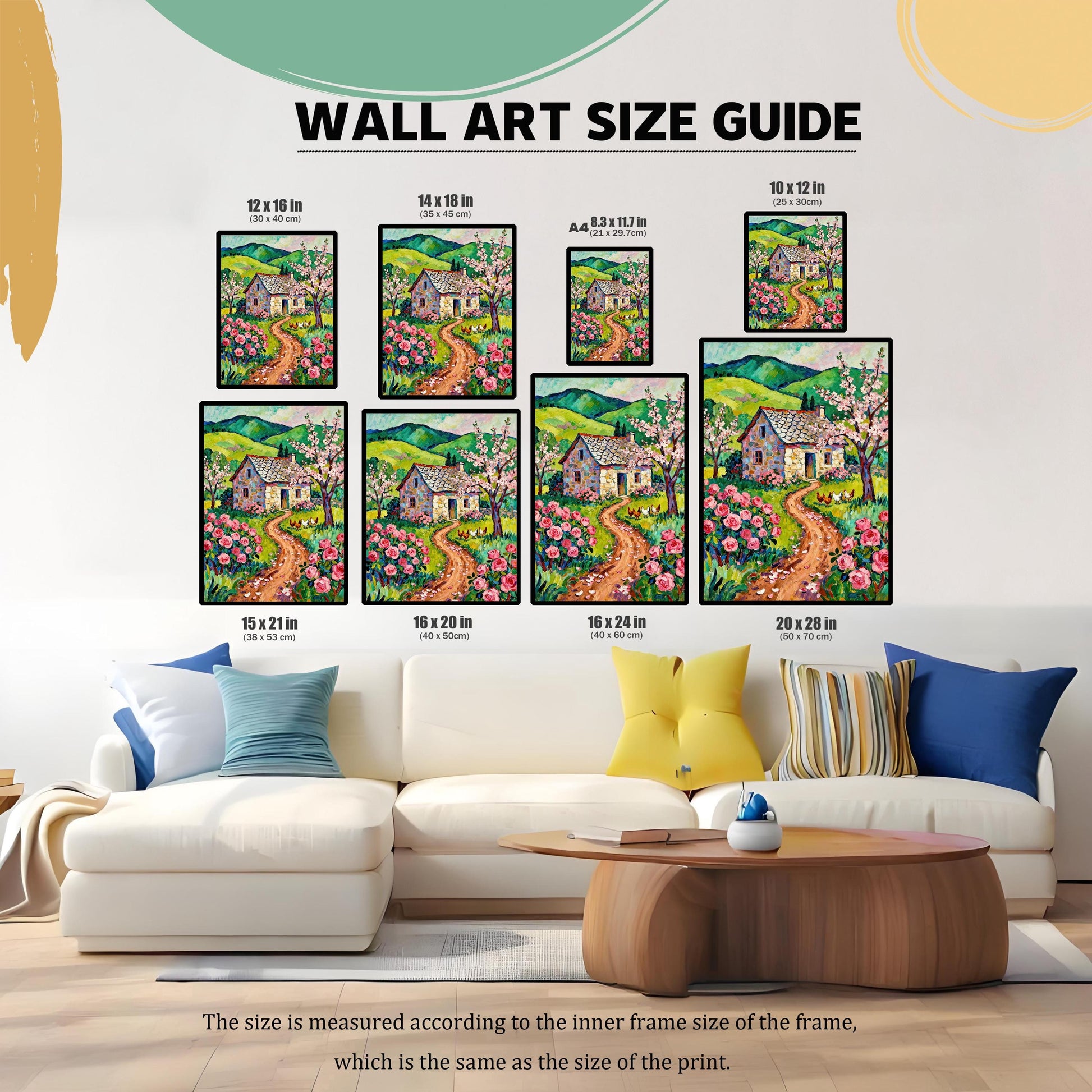 A collage of a cottage painting in various sizes arranged over a living room sofa, illustrating a "Wall Art Size Guide." Different print sizes are labeled in inches and centimeters.