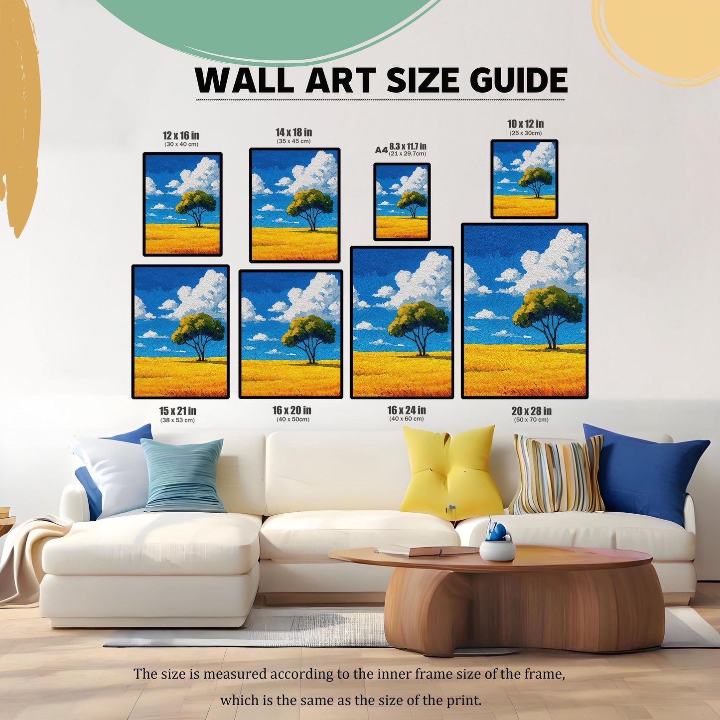 A wall art size guide displays a painting of a tree in a field in various frame sizes, from 8.3 x 11.7 inches (A4) to 20 x 28 inches. The frames are arranged on a wall above a white couch.