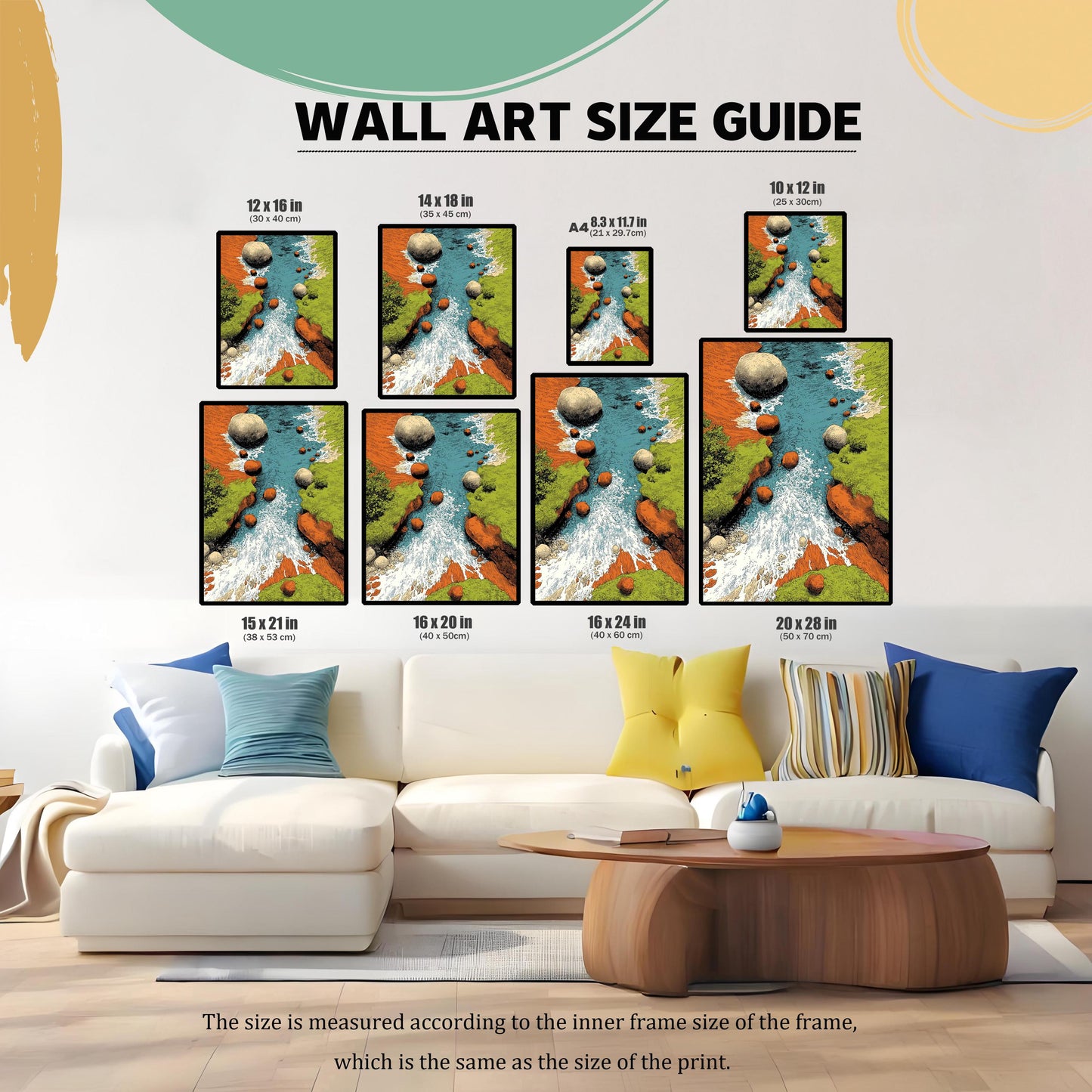 WALL ART SIZE GUIDE. An image demonstrating various framed print sizes placed above a white sectional sofa in a living room setting. The sizes shown (12x16, 14x18, A4, 10x12, 15x21, 16x20, 16x24, and 20x28 inches) all display the framed river landscape art print.