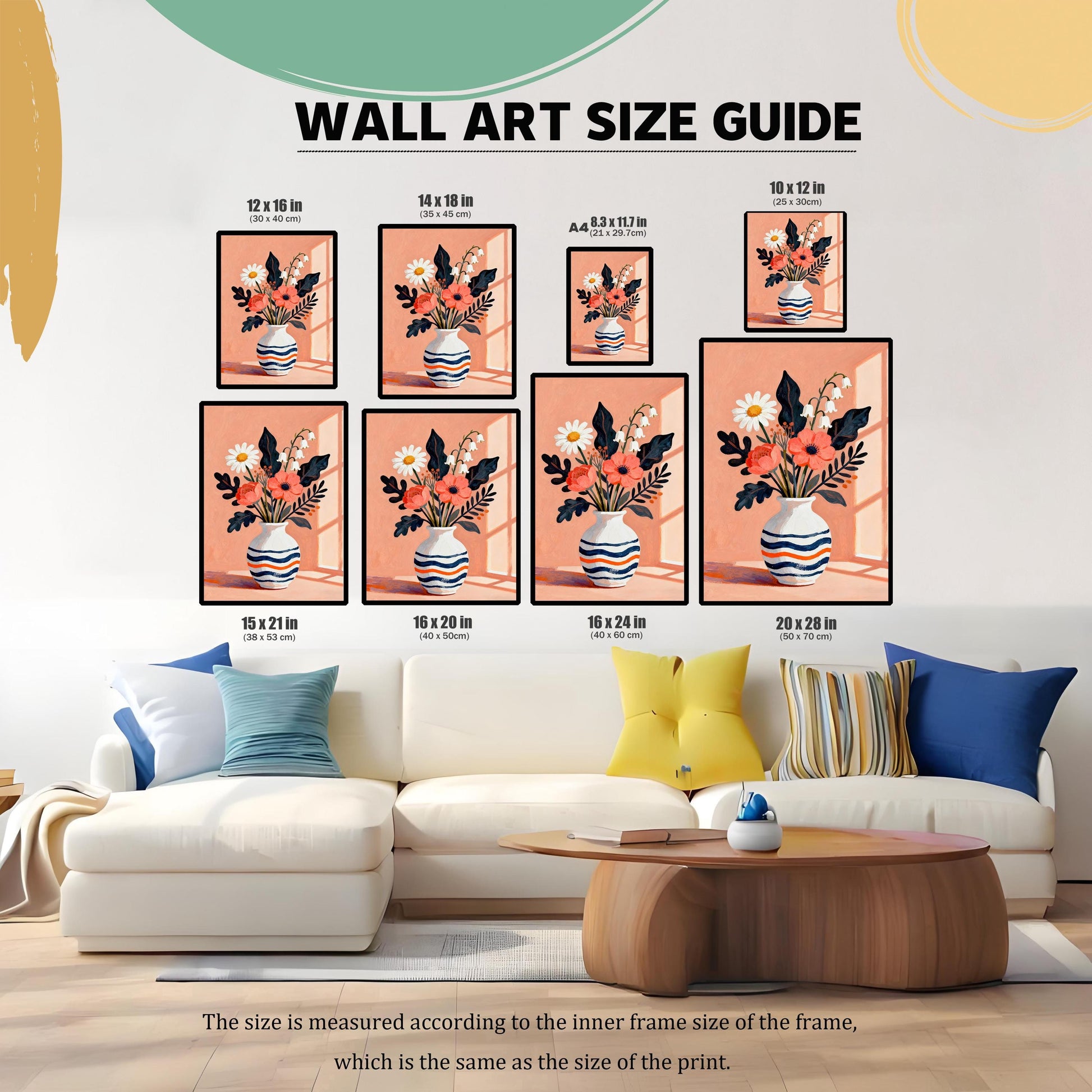 A wall art size guide showing various frame sizes, from 8.3x11.7 inches to 20x28 inches, displayed above a white couch to demonstrate different proportions in a room.