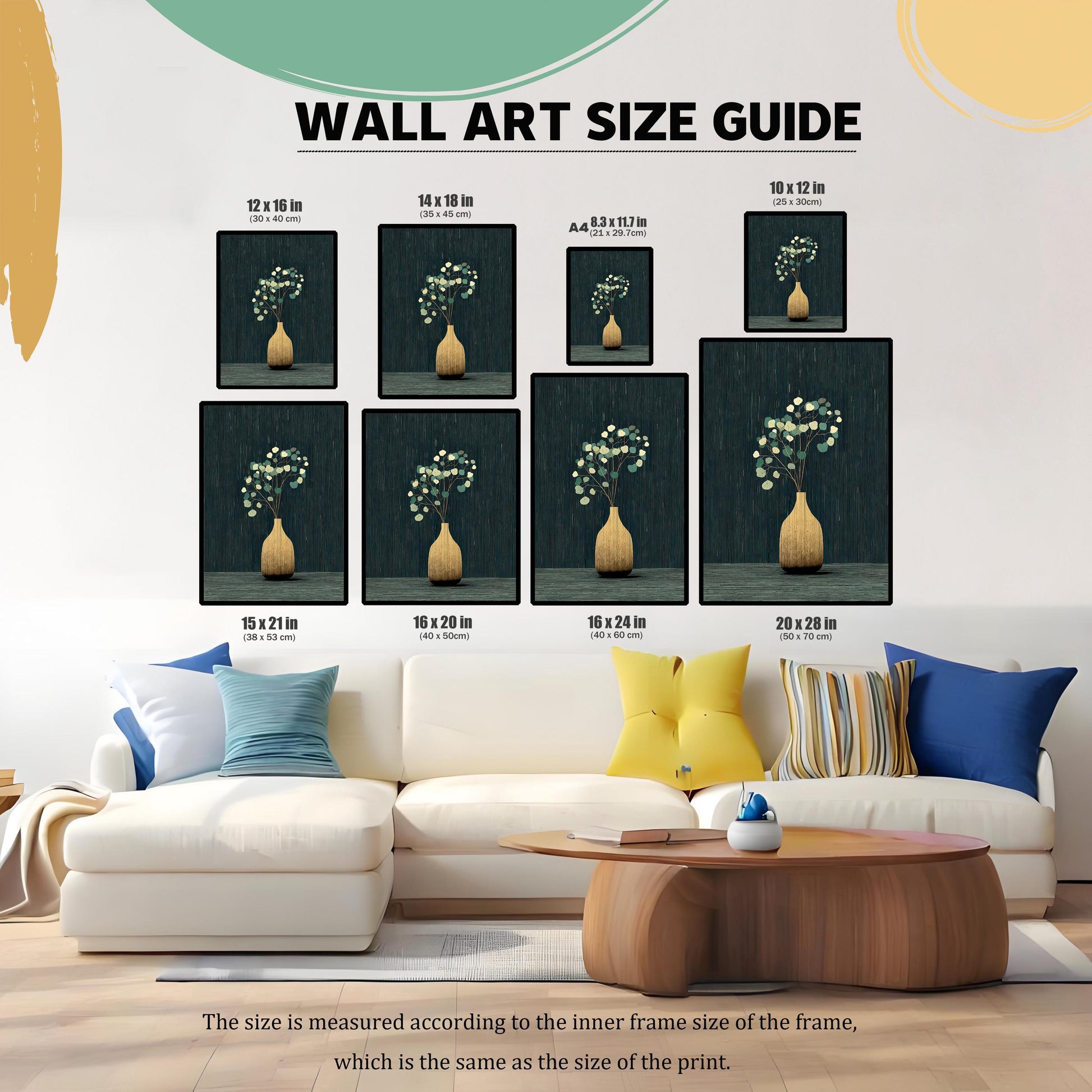 A Wall Art Size Guide graphic showing eight different framed sizes of the golden vase and eucalyptus art print placed above a large white living room sofa. Sizes are listed in inches and centimeters (e.g., 12 x 16 in / 30 x 40 cm).
