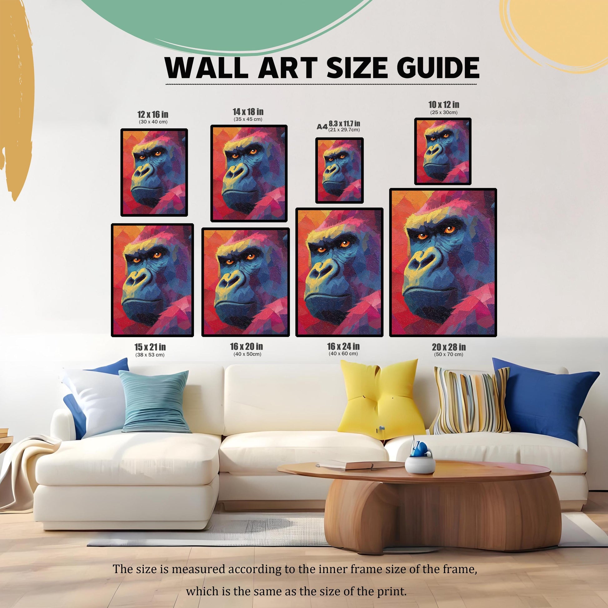 WALL ART SIZE GUIDE. An image demonstrating various print sizes of the gorilla art hanging above a large white couch. Sizes include: 12x16 in, 14x18 in, A4 (8.3x11.7 in), 10x12 in, 15x21 in, 16x20 in, 16x24 in, and 20x28 in.