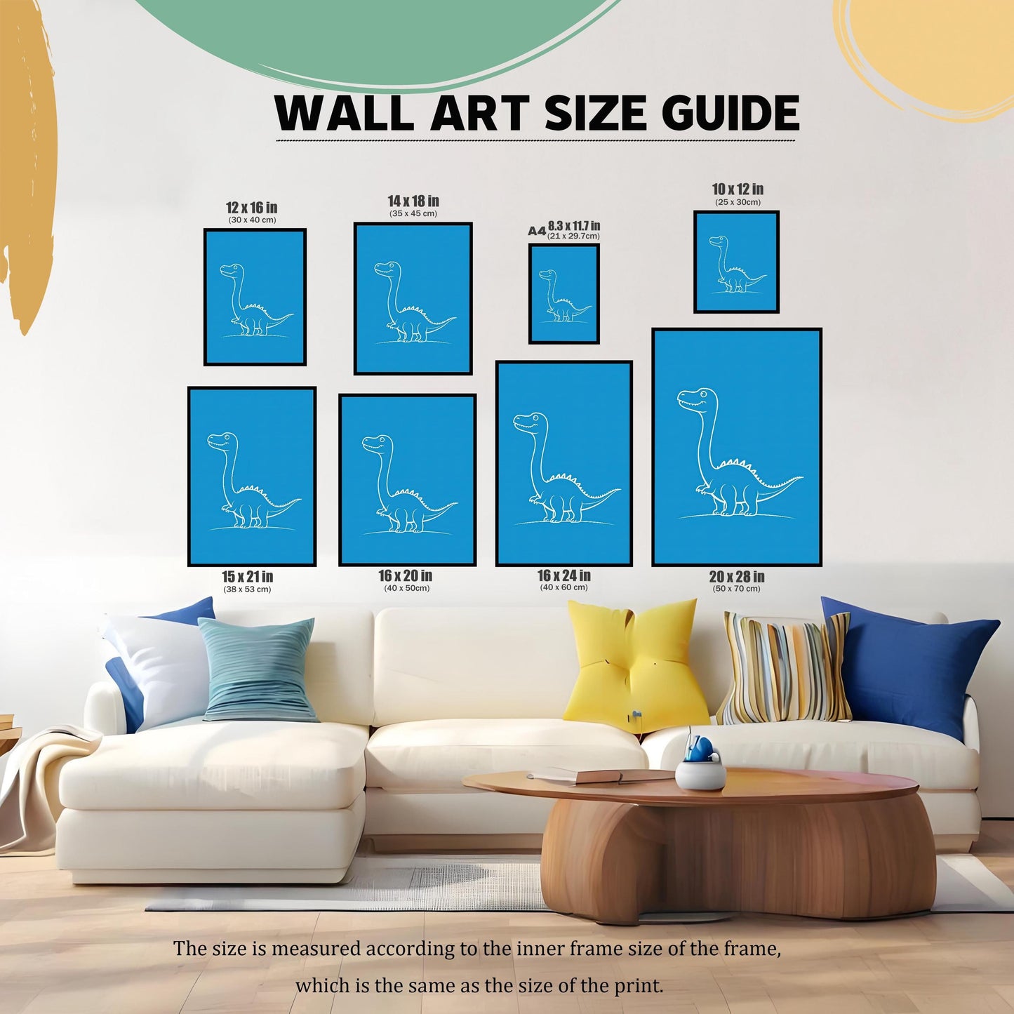 May include: A wall art size guide featuring framed dinosaur art prints in various sizes, including 12x16 inches, 14x18 inches, and 20x28 inches. The guide is displayed above a white sofa with colorful pillows and a wooden coffee table.